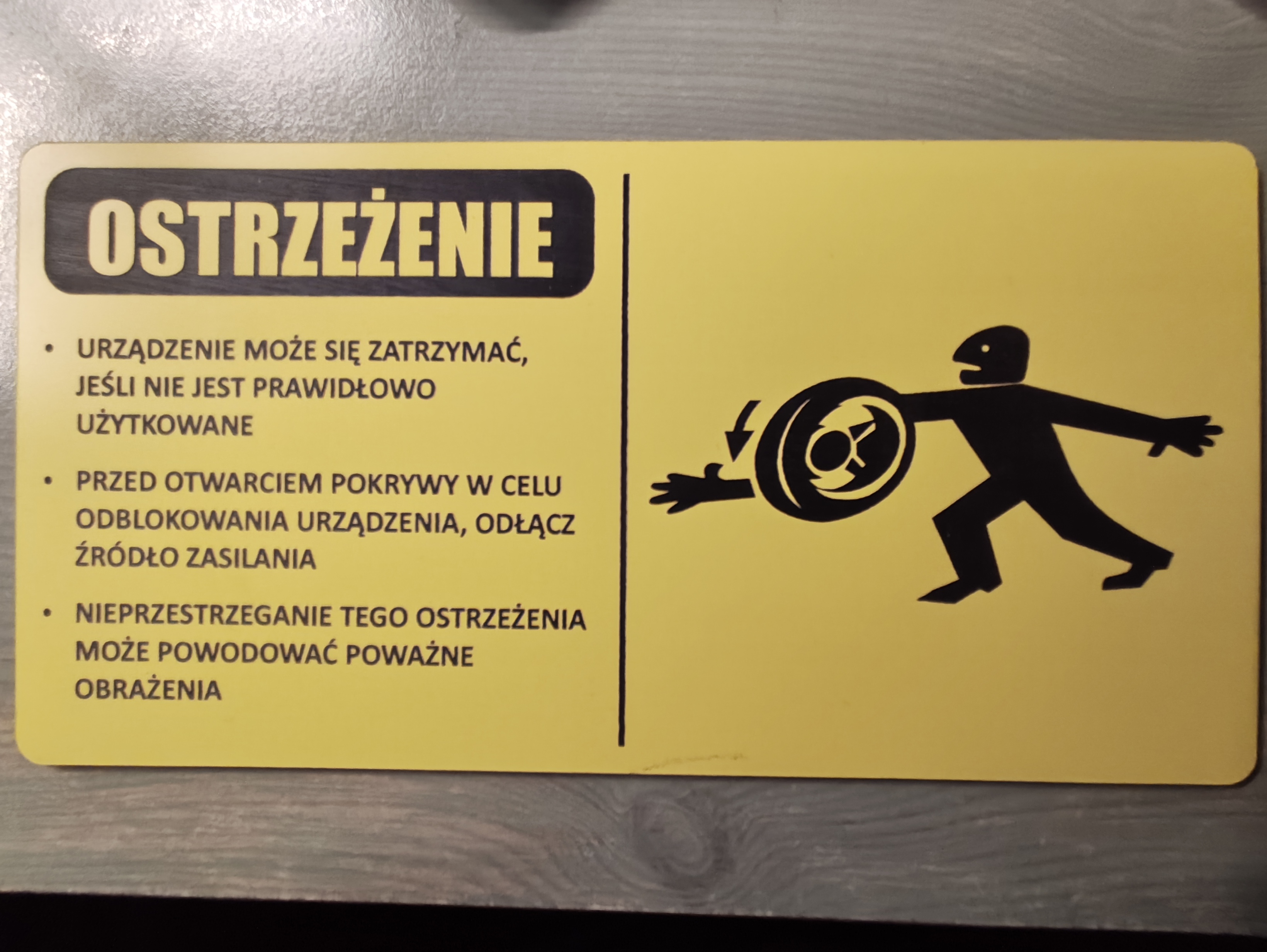 Tabliczka ostrzegawcza z zagrożeniem